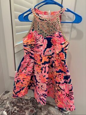 Lilly Pulitzer Girls Pink Navy Orange Floral Halo-Neck Dress with pockets.